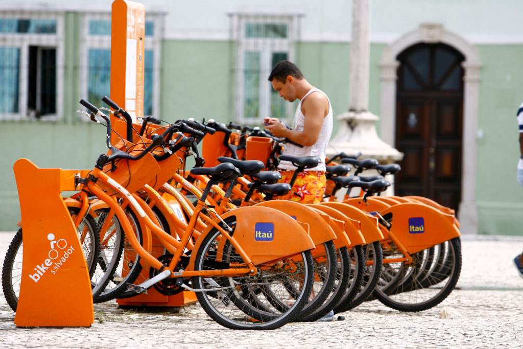 A photo of orange bikes sponsored by Itaú the Brazilian bank in Sao Paulo.